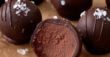 Delicious brownie batter truffles made with cottage cheese, perfect for a sweet snack.