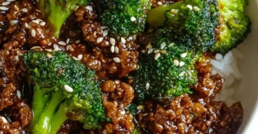 Healthy dish of hamburger meat stir-fried with fresh broccoli, served in a bowl.