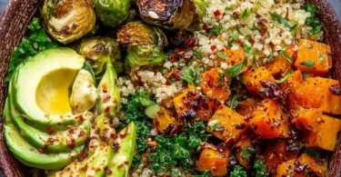 Quinoa and Veggie Power Bowls topped with fresh vegetables